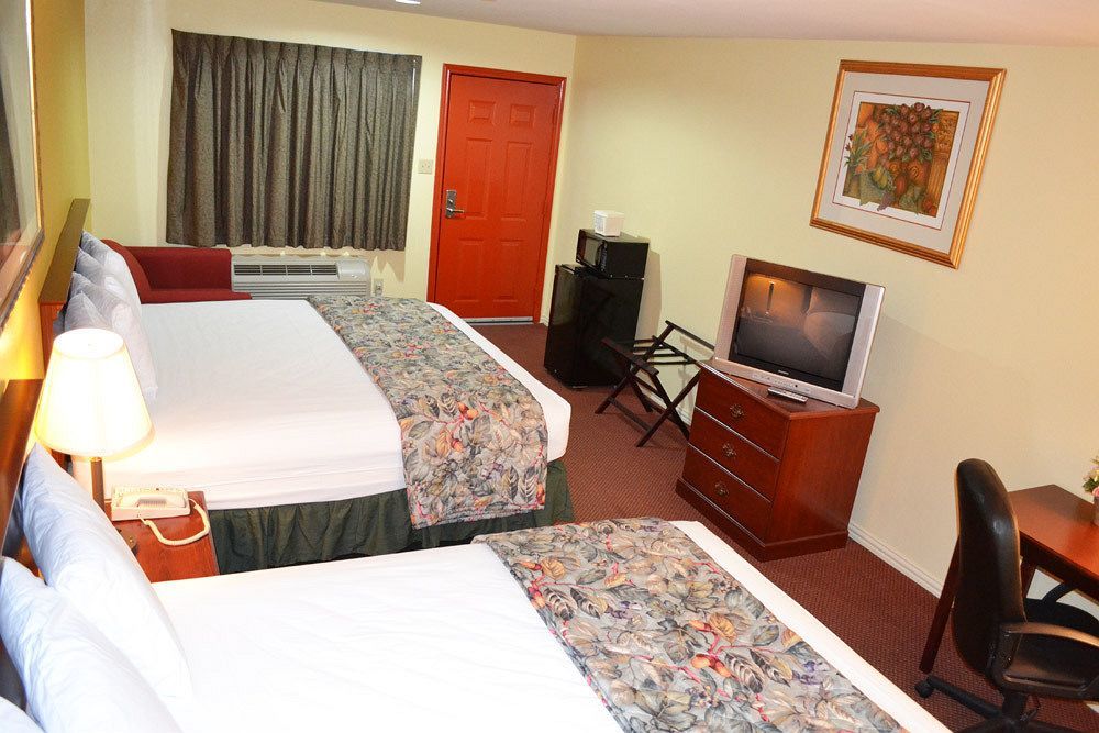 Executive Inn & Suites Magnolia Eksteriør bilde